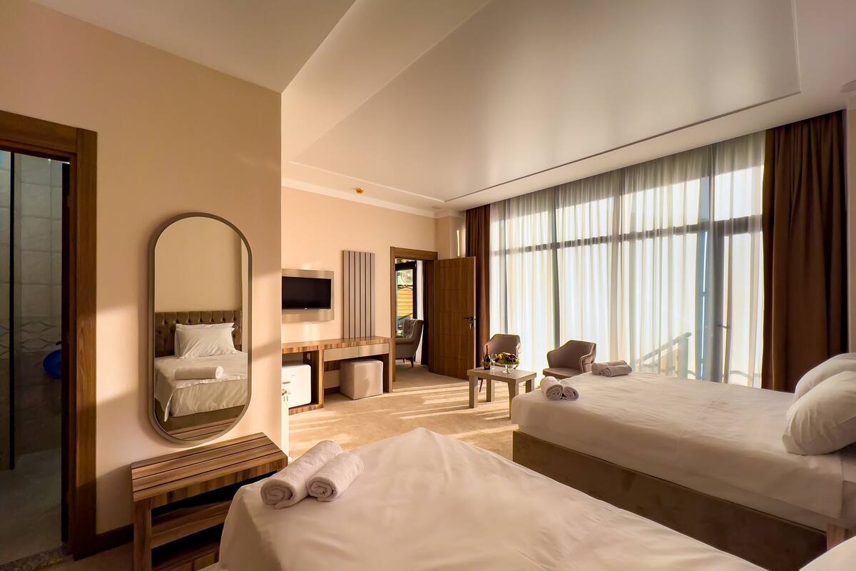 Executive Apartment | Frette Italian sheets, premium bedding, Select Comfort beds, desk