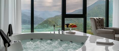 Royal Suite | Frette Italian sheets, premium bedding, Select Comfort beds, desk