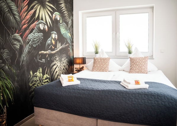 1 habitación, tabla de planchar con plancha, cuna de viaje y wifi