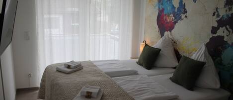 1 bedroom, travel crib, WiFi, bed sheets