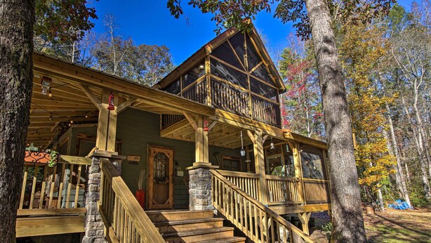 A cabin with a wooden staircase, stone pillars, and a balcony. - Tubes & Kayaks: 5-acre North Georgia Mtn Retreat (Sautee Nacoochee)