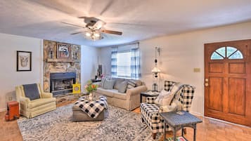 TV, fireplace, books