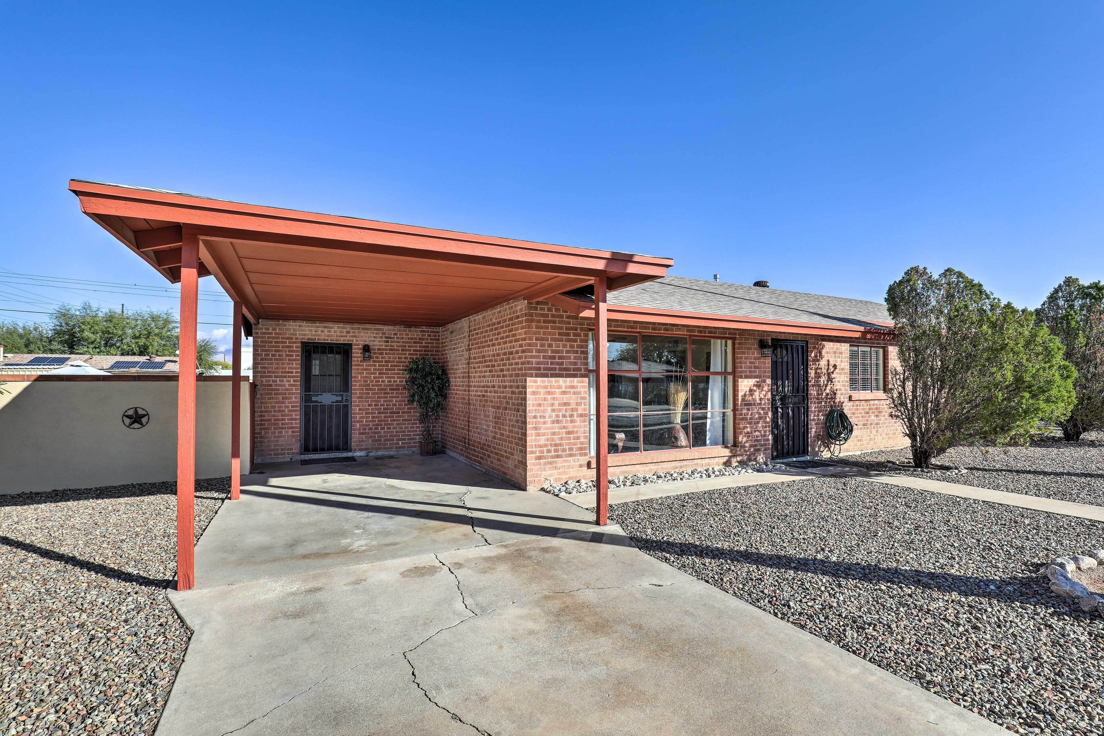 A single-story brick building with a covered patio area.