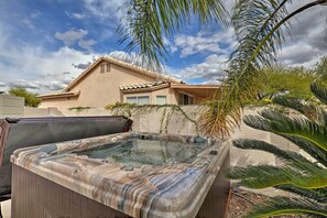 A spa area with hot tubs and a house in the background. - Tucson Getaway w/ Yard, Pool, Hot Tub + Gas Grill! (Tucson)