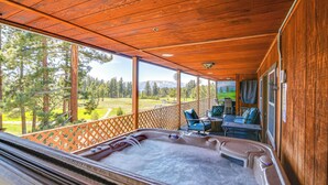 A wooden deck with a hot tub, outdoor seating, and a view of a mountainous landscape. - Game Room, Mtn Views! Unit 1 Mi to Heavenly Resort (Stateline)