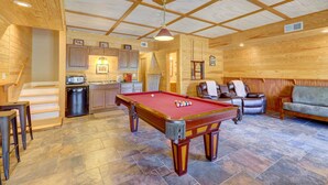 A pool table in a room with wooden walls and a tiled floor. - Sparta Home w/ On-site Lake Access! (Milledgeville)