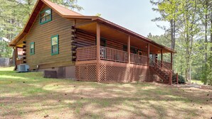 A log cabin with a porch, a staircase, and a small deck. - Blairsville Cabin in the Pines 1 Mi to Lake (Blairsville)