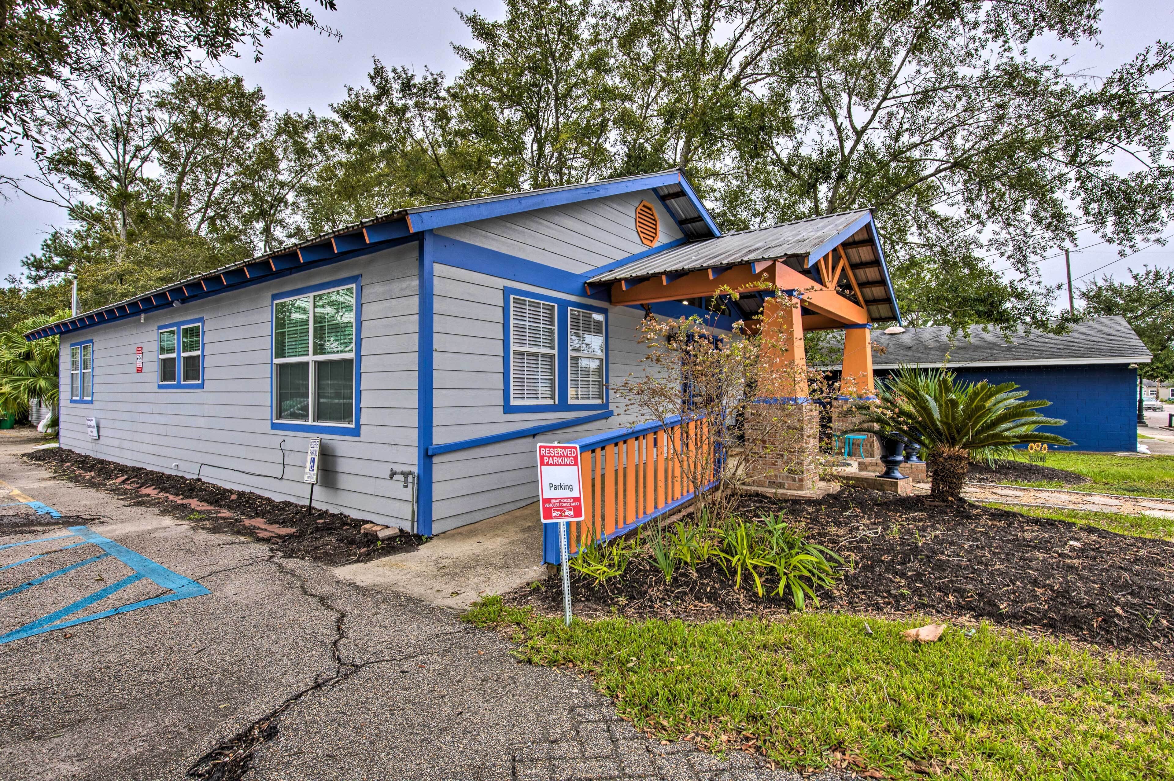 A small, single-story building with blue trim and a sloped roof.