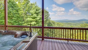 A hot tub on a wooden deck with a view of a forest and mountains. - Mineral Bluff 'bear Ridge Cabin' w/ Hot Tub! (Mineral Bluff)