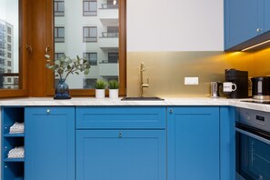 Apartment, 2 Bedrooms, 2 Bathrooms | Private kitchen | Microwave, dishwasher, coffee/tea maker, cookware/dishes/utensils - Progress Apartment by Renters Prestige (Warsaw)