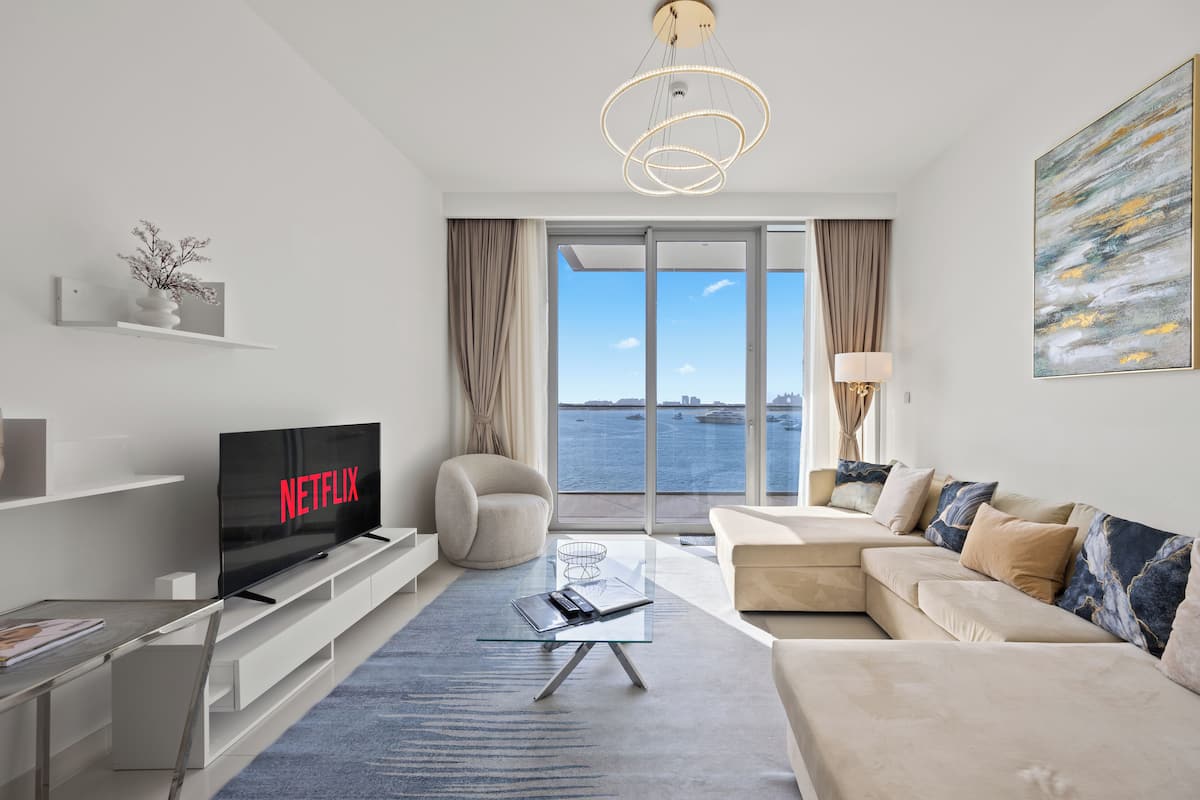 Signature Apartment, 2 Bedrooms, Balcony, Sea View | Living area | 55-inch LED TV with cable channels, Netflix, pay films