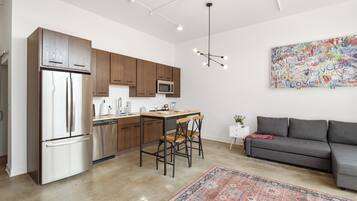 Panoramic Apartment | Living area | Flat-screen TV