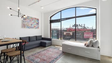Panoramic Apartment | Living area | Flat-screen TV