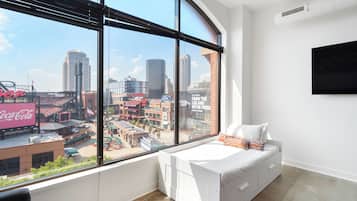 Apartemen Panorama | Area keluarga | TV layar datar