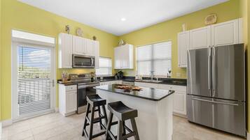 Townhome, Multiple Beds, Patio, Garden View | Private kitchen