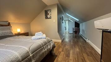 1 bedroom, desk, iron/ironing board, travel cot