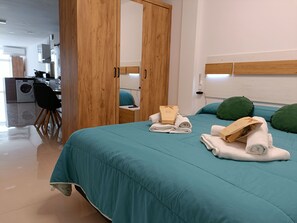 1 bedroom, desk, iron/ironing board, travel cot