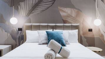 Deluxe kamer | 1 slaapkamer, luxe beddengoed, pillowtop-bedden, een kluis op de kamer