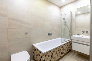 Hair dryer, towels, soap, toilet paper