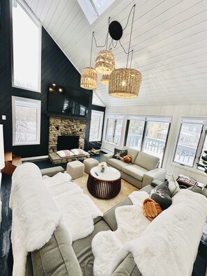 Smart TV, fireplace, books