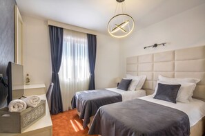 4 dormitorios, tabla de planchar con plancha, Internet y ropa de cama