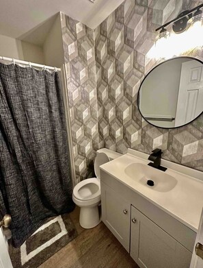 Shower, towels, soap, shampoo