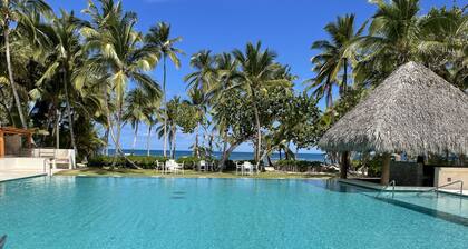 Enjoy the beautiful El Portillo beach from this family sized condo.