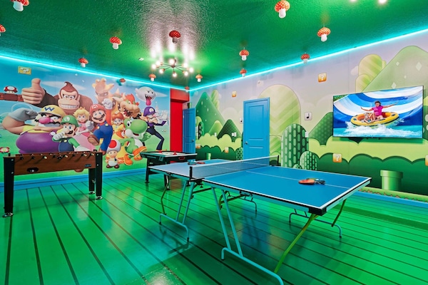 Garage-turned-games-room with Mario Bros theme