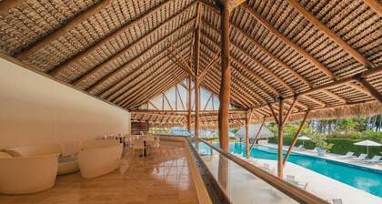 Luxury Beachfront Getaway at El Portillo Residences & Beach Club