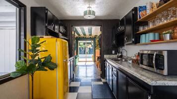 Fridge, microwave, stovetop, coffee/tea maker