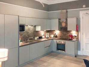 Dishwasher, high chair, cookware/dishes/utensils - Flat 3, Barron House (Nairn)