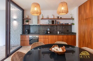 Fridge, microwave, stovetop, coffee/tea maker