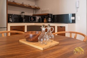 Fridge, microwave, stovetop, coffee/tea maker