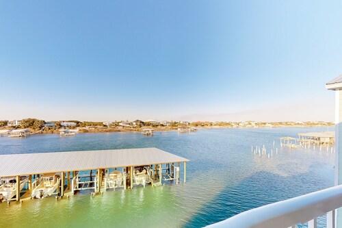 Waterfront, gulf view condo by beach with pool, dock & balcony