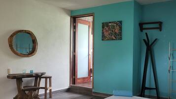 Habitación doble Deluxe, 1 cama King size, vista parcial al océano | Wifi gratis y ropa de cama