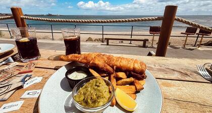 Experience coastal bliss in Newbiggin-by-the-Sea, Northumberland.