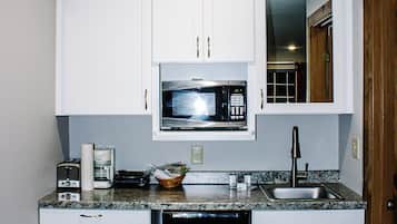 Microwave, coffee/tea maker, toaster, dining tables