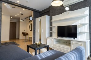 Family Studio | Living area | 52-inch flat-screen TV with cable channels - The Business Class Suit (Istanbul)