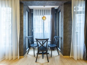 Superior Studio | Living area | 52-inch flat-screen TV with cable channels - The Business Class Suit (Istanbul)