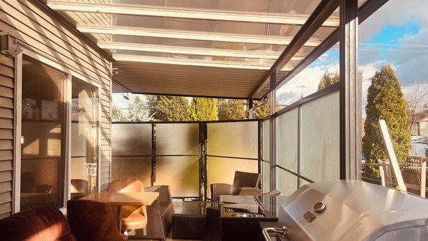 A covered patio area with a grill, outdoor furniture, and a view of the neighborhood. - RVH"S/
 Rm B  in a Home/Shared Living Space  (Surrey)