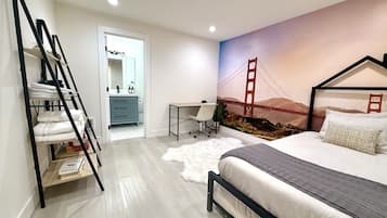 1 bedroom, desk, iron/ironing board, travel crib