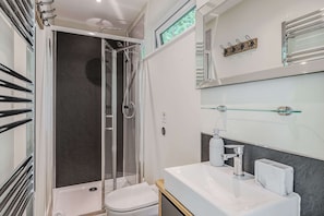 Shower, hair dryer, towels