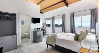 Appartement de vacances 'Casa Lomo El Aire Helecho' avec vue sur la mer, piscine partagée et Wi-Fi