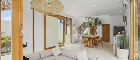 Deluxe Villa, 3 Bedrooms | Living area | 35-inch flat-screen TV with satellite channels