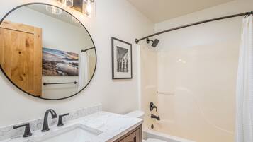 Hair dryer, towels, soap, shampoo