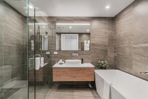 Shower, hair dryer, towels