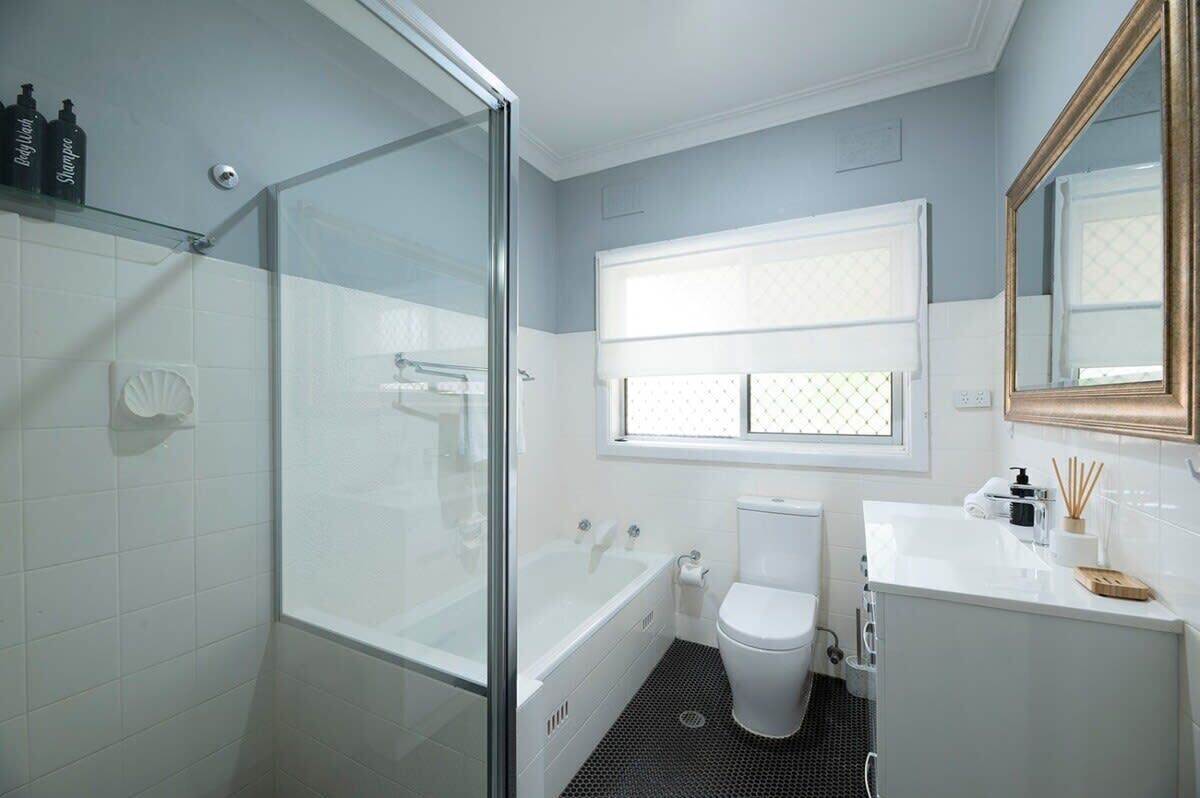 Shower, hair dryer, towels, shampoo