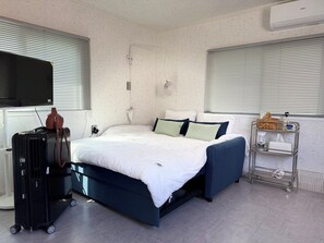 1 chambre, coffres-forts dans les chambres, fer et planche à repasser