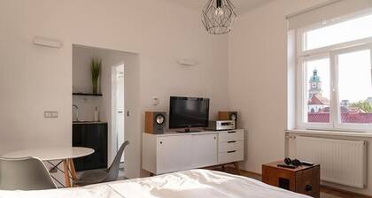 Modern Studio in the Heart of Maribor with Stunning Sunset Views