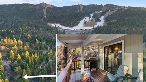 Une vue sur la montagne avec une terrasse et un espace salon extérieur.